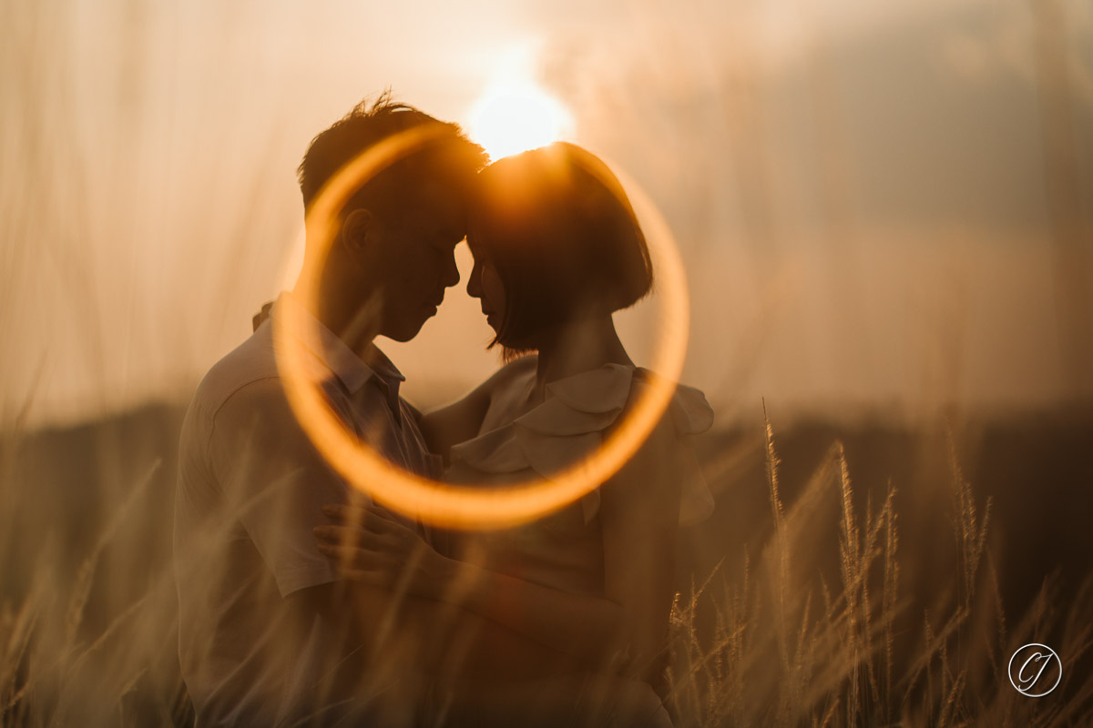 Ring flare couple portrait