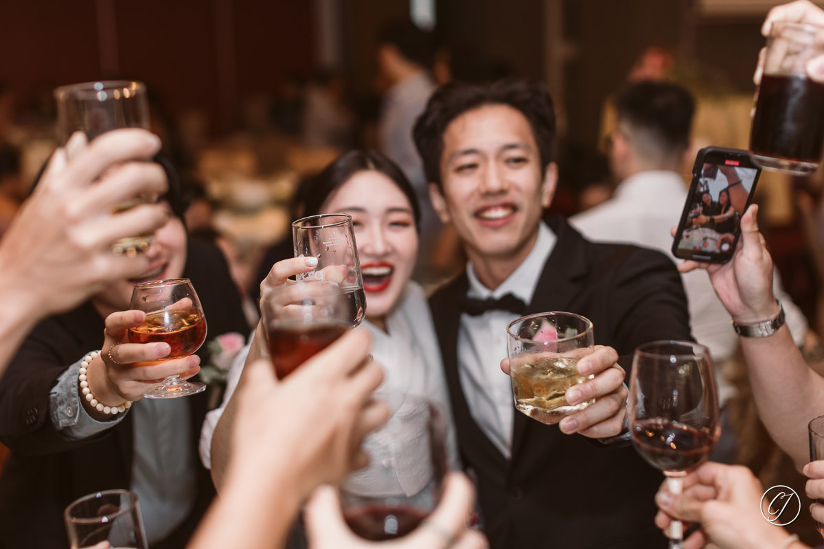 Yam Seng, table toasting with the guests