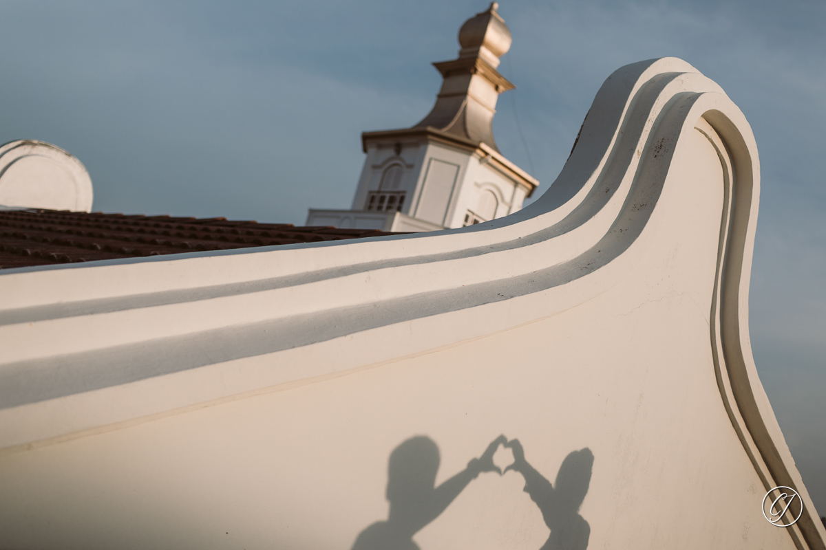 Shadow pose casted on the heritage wall