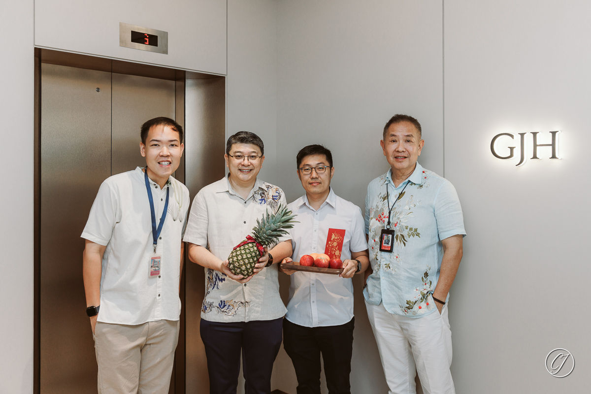 Preparing to roll pineapple for the ceremony