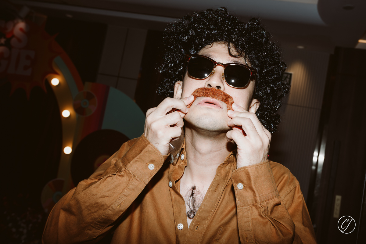 Julian with moustache and chest hair