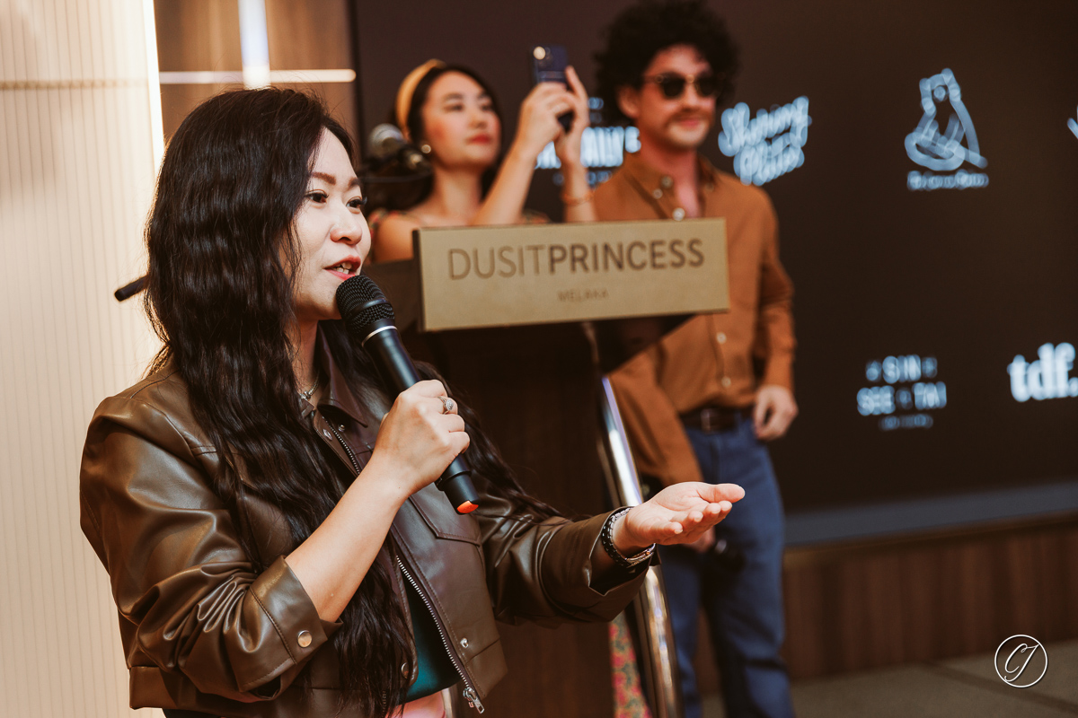 Emcee Jess Ong hosting the dinner